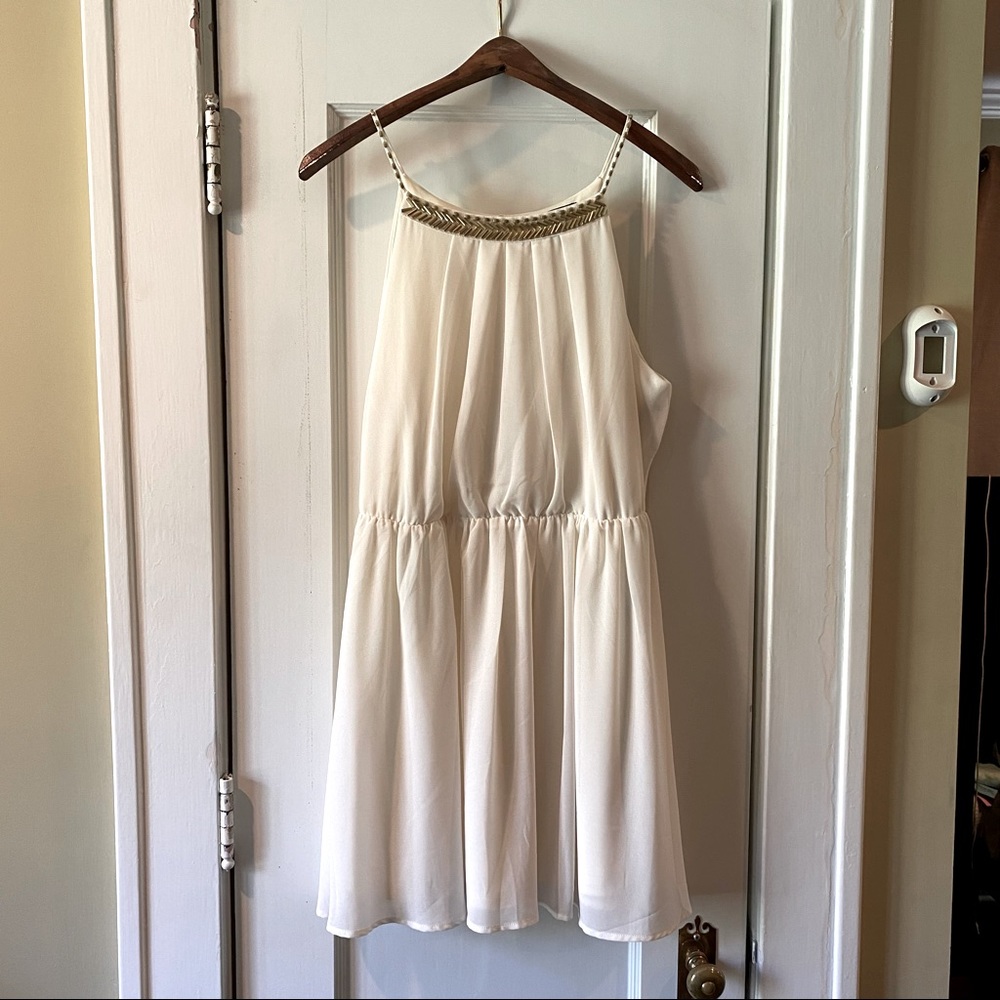 Cream white sleeveless dress with keyhole back